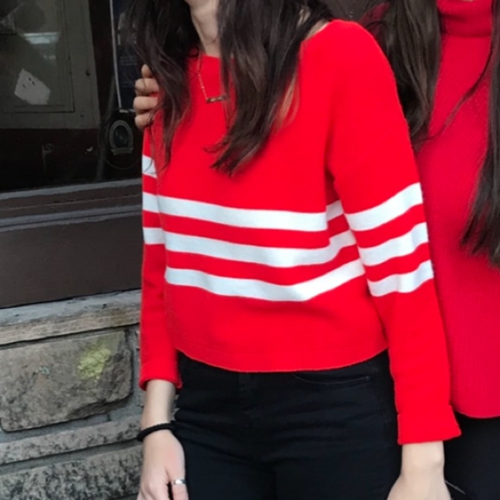 Red cropped sweater with white stripes